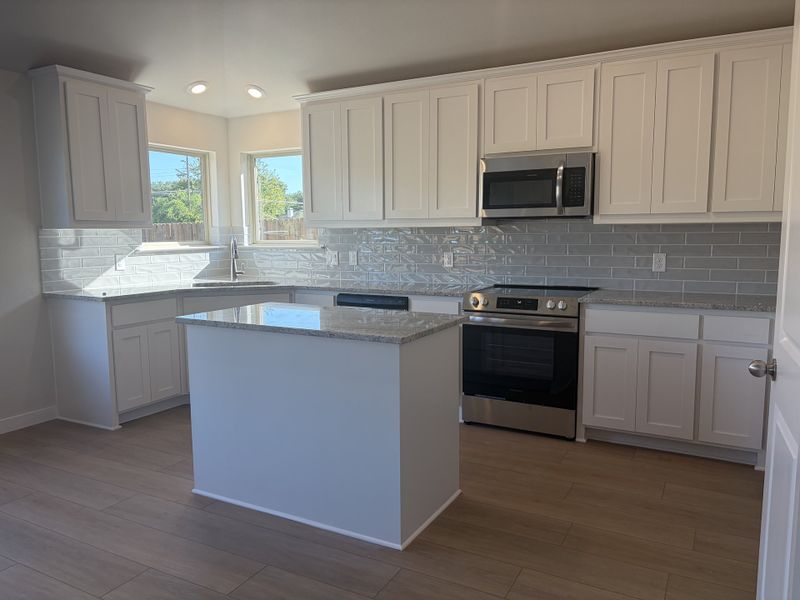 Furnished interior view inside a new home in Craftsman's Corner, Cleburne (Image 3).