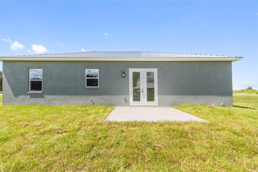 Front exterior of a new home in , Fort Meade, FL, highlighting curb appeal (Image 16).