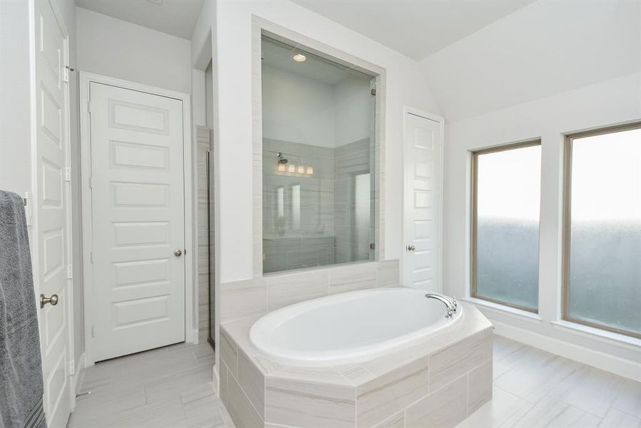 Ensuite Master Bath with Standalone Shower and Luxurious Soaking Tub