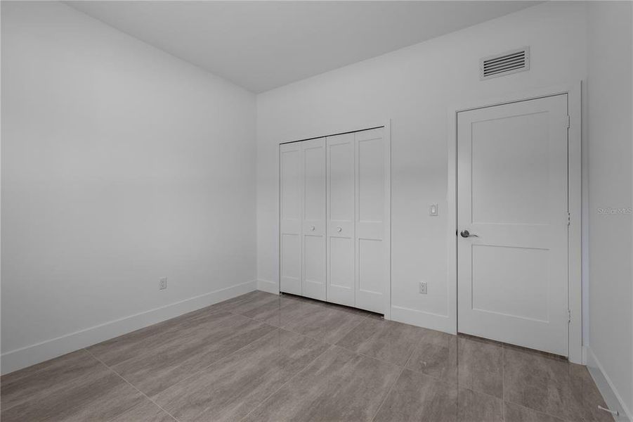 Spacious, unfurnished interior of a new home in , Lehigh Acres (Image 23). Spacious, unfurnished interior of a new home in , Lehigh Acres (Image 23).
