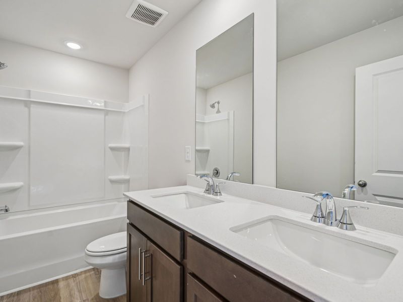 Furnished interior view inside a new home in Harmony Manor, Fairburn (Image 9).