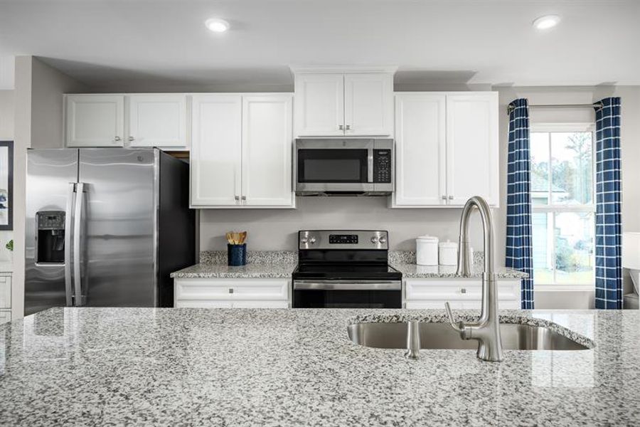 Representative furnished interior of a home built from the Aruba Bay by Ryan Homes in Carolina Crofts, Greenville (Image 3).