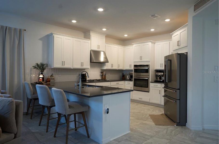 Furnished interior view inside a new home in The Waters at Center Lake Ranch, St. Cloud (Image 5).