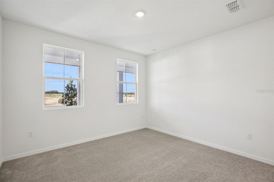 Spacious, unfurnished interior of a new home in Northlake at Ovation, Winter Garden (Image 35).