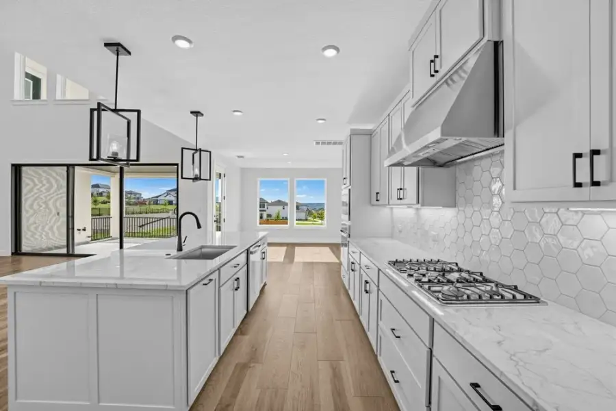 Furnished interior view inside a new home in Travisso, Leander (Image 9).