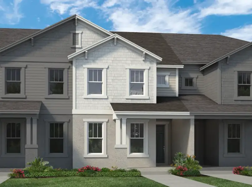 Representative exterior photo of a completed home built from the Whitney by Rockwell Homes in Harvest at Ovation - Townhomes, Winter Garden, FL (Image 24).