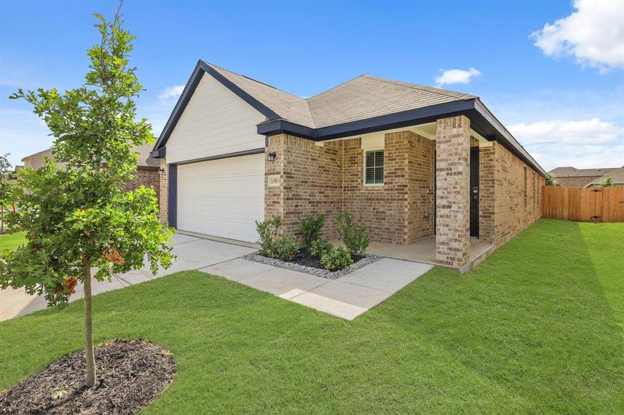 Front exterior of a new home in Christian Meadows, Ennis, TX, highlighting curb appeal (Image 2). Front exterior of a new home in Christian Meadows, Ennis, TX, highlighting curb appeal (Image 2).