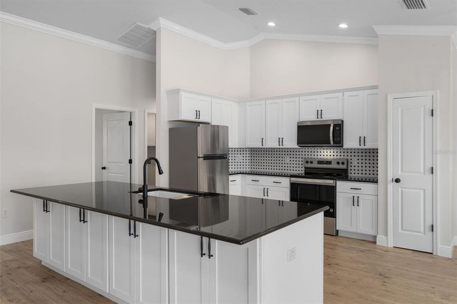 Furnished interior view inside a new home in , Weeki Wachee (Image 17).