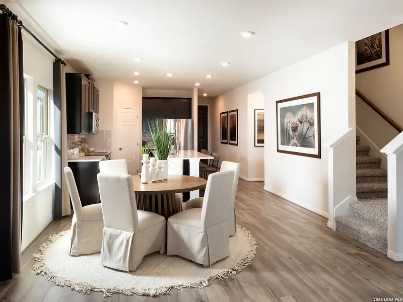 Furnished interior view inside a new home in Estancia Ranch - Premier Series, San Antonio (Image 9).