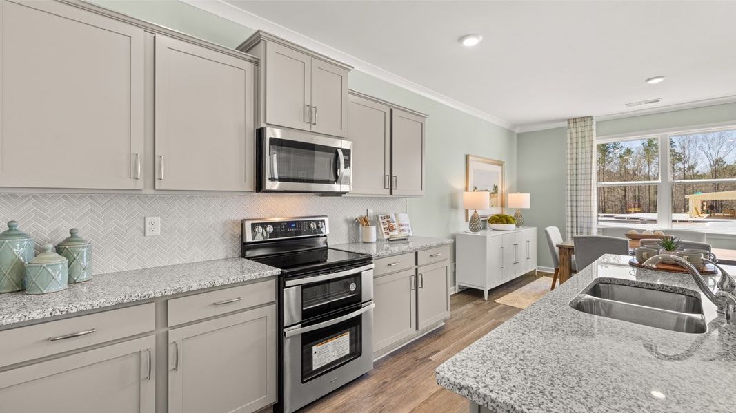 Representative furnished interior of a home built from the Denton by D.R. Horton in Jackson Landing, Jefferson (Image 8).