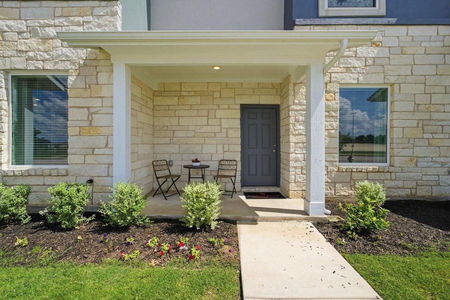 Exterior details and patio area of a home in Municipal Drive Townhomes, Leander (Image 3).