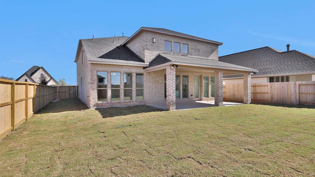 Exterior details and patio area of a home in Grange 50', Katy (Image 4). Exterior details and patio area of a home in Grange 50', Katy (Image 4).