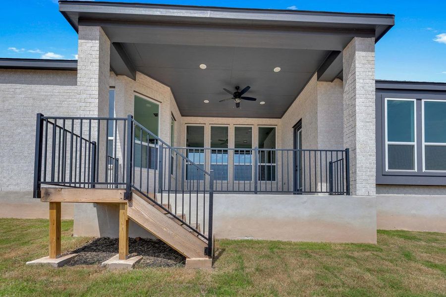Front exterior of a new home in Lariat: 70ft. lots, Liberty Hill, TX, highlighting curb appeal (Image 2). Front exterior of a new home in Lariat: 70ft. lots, Liberty Hill, TX, highlighting curb appeal (Image 2).