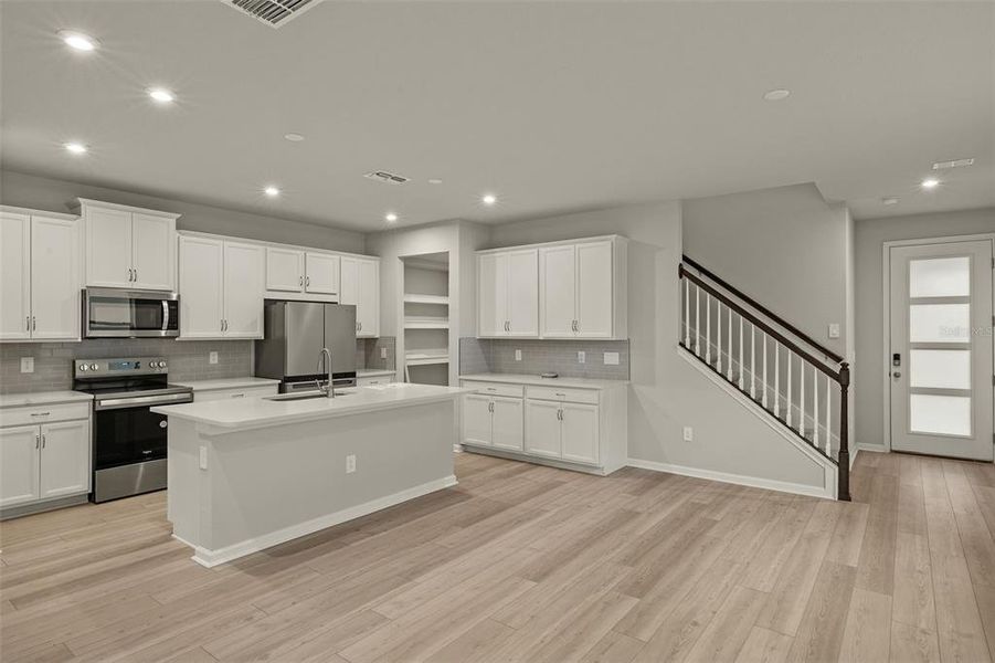 Furnished interior view inside a new home in Bloomingdale Townes, Brandon (Image 12). Furnished interior view inside a new home in Bloomingdale Townes, Brandon (Image 12).