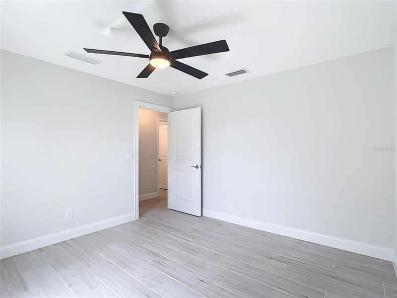 Spacious, unfurnished interior of a new home in , Port Charlotte (Image 13).