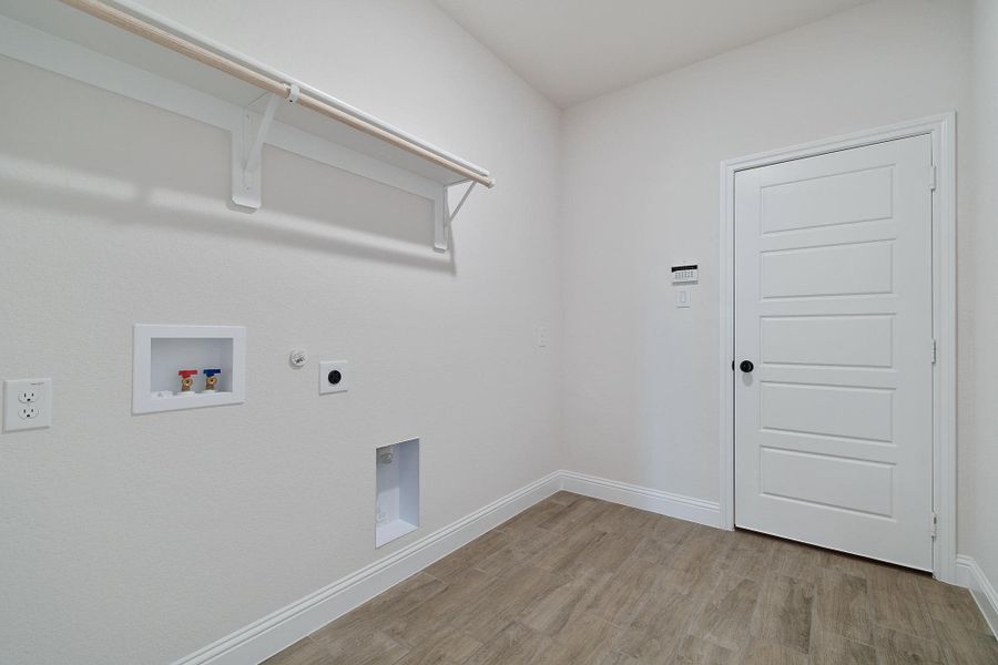 Laundry Room | Concept 2972 at Villages of Walnut Grove in Midlothian, TX by Landsea Homes