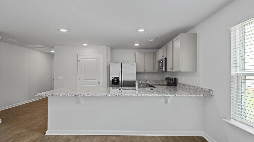 Furnished interior view inside a new home in Center Pointe, Santee (Image 3).