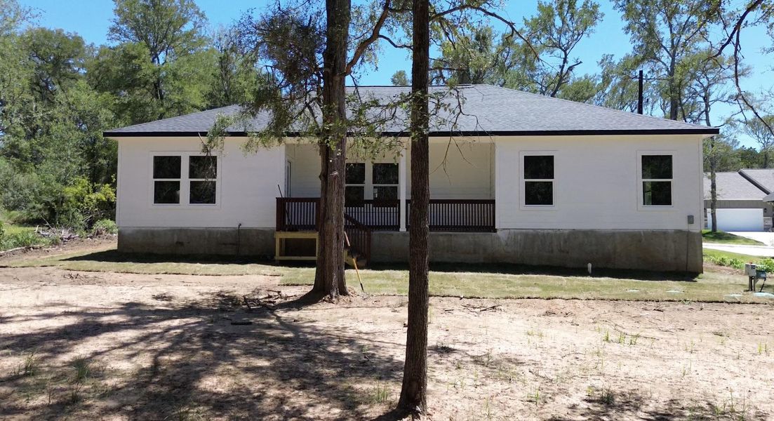 Front exterior of a new home in , Bastrop, TX, highlighting curb appeal (Image 20). Front exterior of a new home in , Bastrop, TX, highlighting curb appeal (Image 20).