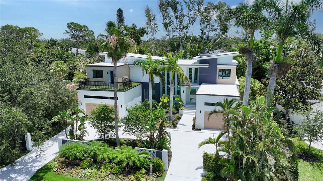 Front exterior of a new home in , Sarasota, FL, highlighting curb appeal (Image 23).