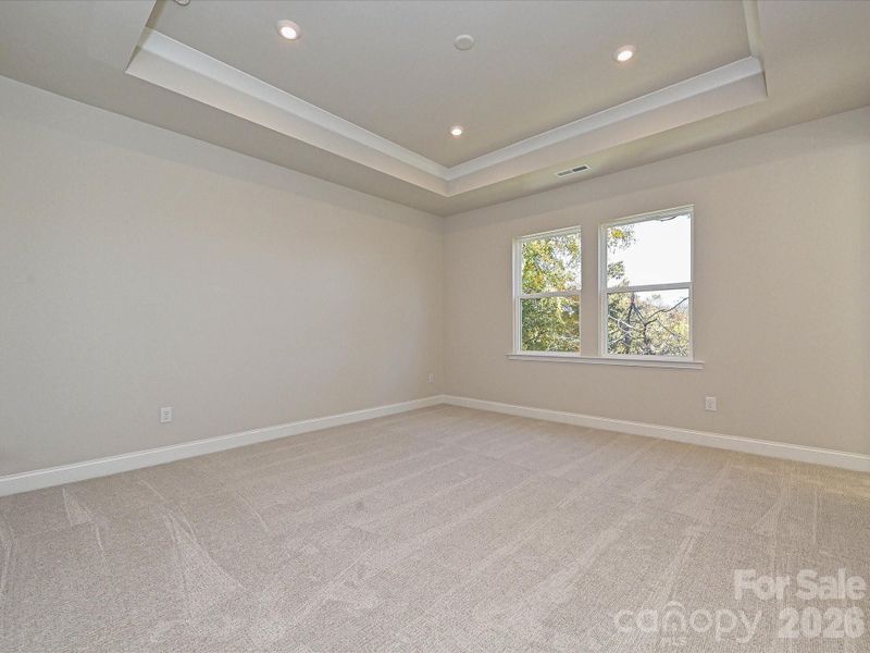 Primary Bedroom with Tray Ceilings Primary Bedroom with Tray Ceilings