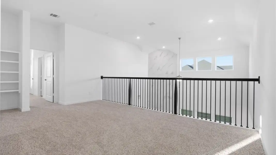 Representative unfurnished interior of a home built from the Adrian by D.R. Horton in Alexander 65' Homesites, Pearland (Image 24).