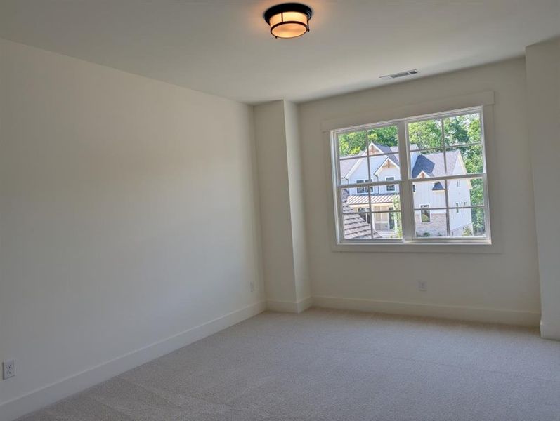 Spacious, unfurnished interior of a new home in Arden on Lanier, Cumming (Image 17).