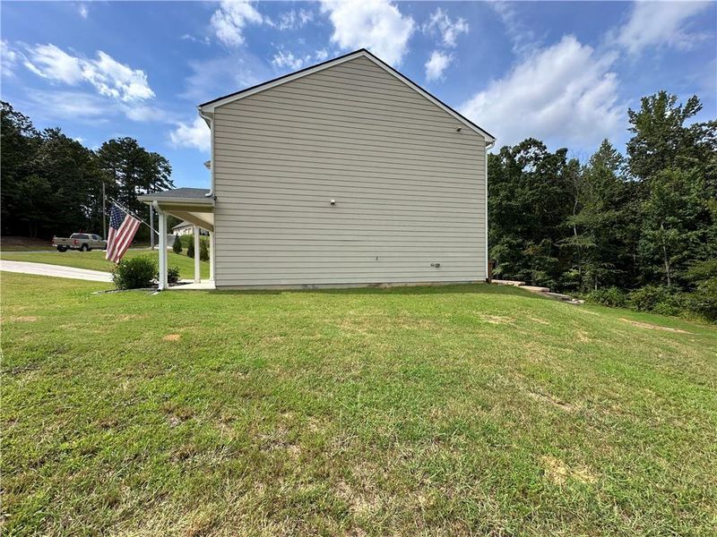 Exterior details and patio area of a home in , Cedartown (Image 24).