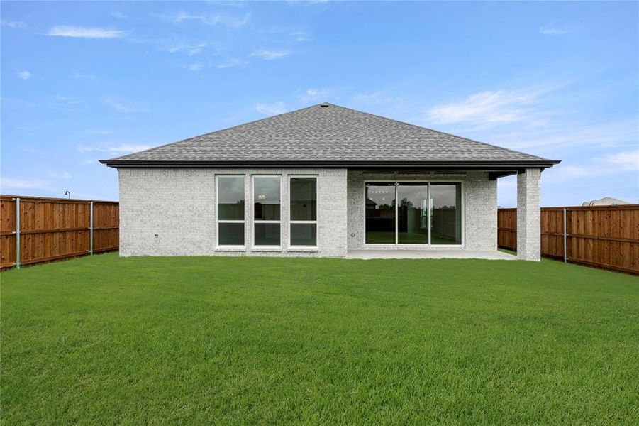 Front exterior of a new home in Las Lomas, Forney, TX, highlighting curb appeal (Image 26).