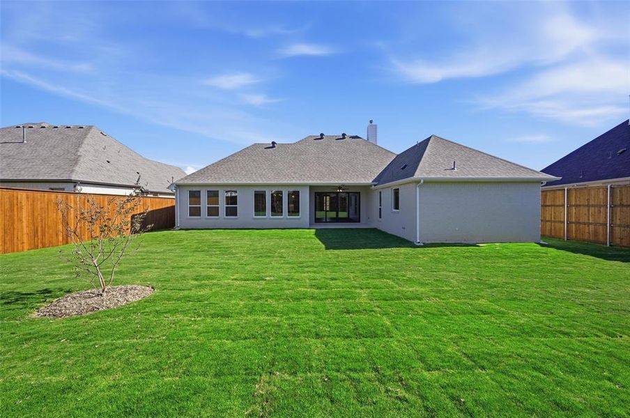 Exterior details and patio area of a home in LeTara, Haslet (Image 25).