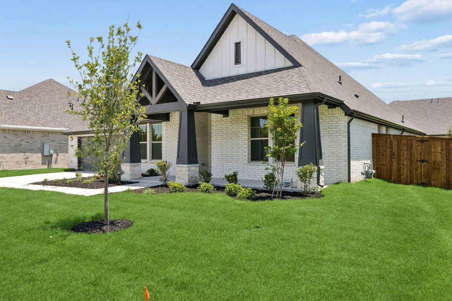 Front exterior of a new home in Dove Hollow, Waxahachie, TX, highlighting curb appeal (Image 2). Front exterior of a new home in Dove Hollow, Waxahachie, TX, highlighting curb appeal (Image 2).