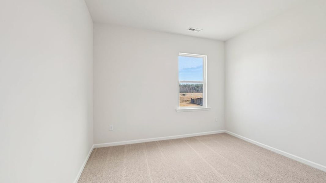 Spacious, unfurnished interior of a new home in Shahbain Reserve, Raeford (Image 22). Spacious, unfurnished interior of a new home in Shahbain Reserve, Raeford (Image 22).