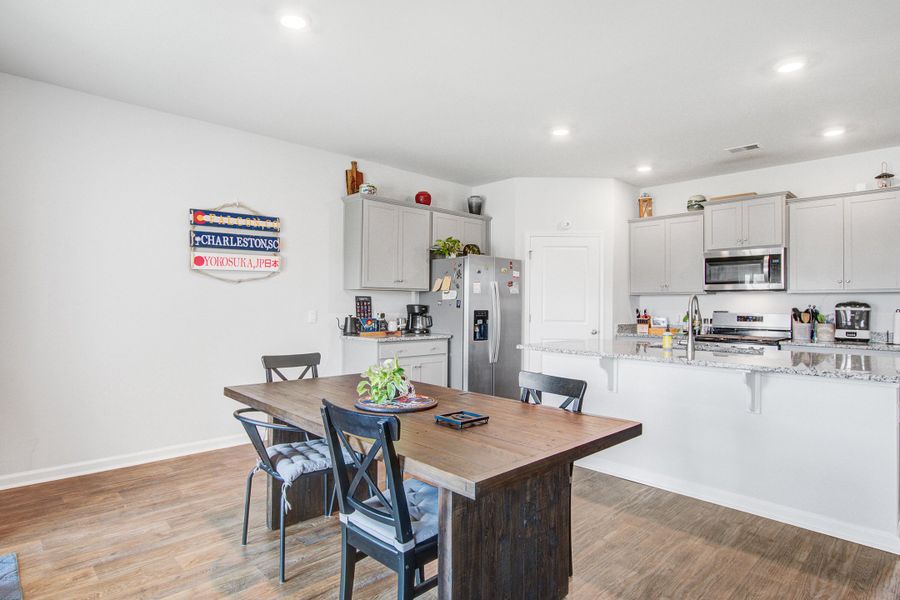 Furnished interior view inside a new home in Pine Hills at Cane Bay, Summerville (Image 11).