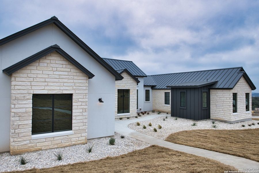 Front exterior of a new home in , San Antonio, TX, highlighting curb appeal (Image 16). Front exterior of a new home in , San Antonio, TX, highlighting curb appeal (Image 16).