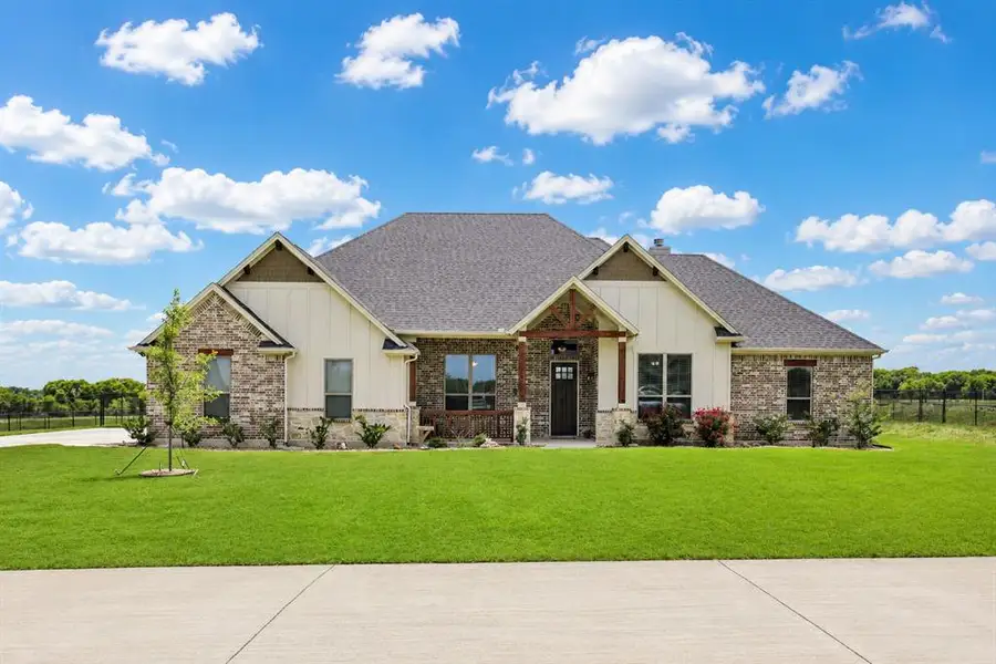 Front exterior of a new home in , Waxahachie, TX, highlighting curb appeal (Image 21).