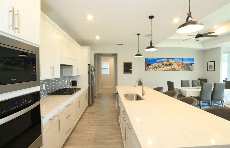 Furnished interior view inside a new home in Del Webb Tradition, Port St. Lucie (Image 7).