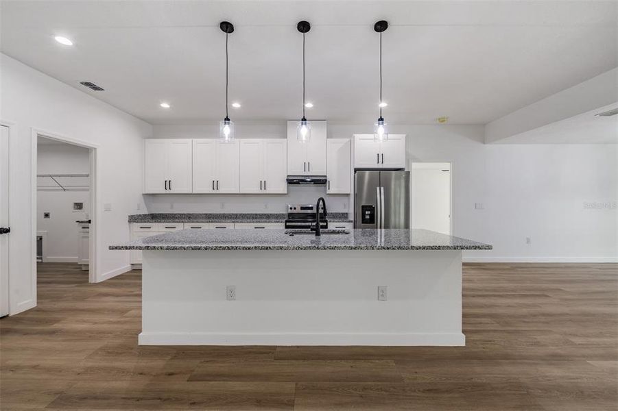 Furnished interior view inside a new home in , Dade City (Image 5).
