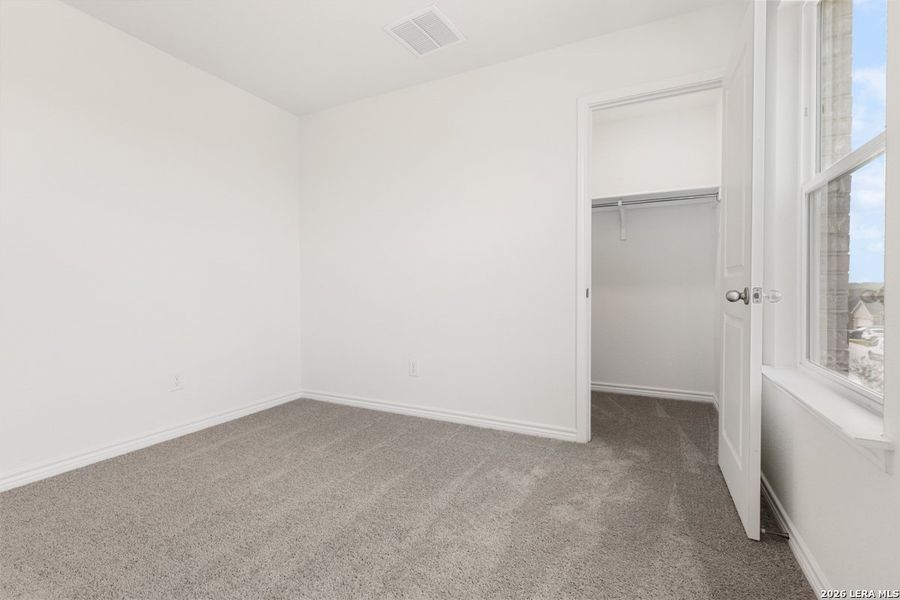 Spacious, unfurnished interior of a new home in Hidden Bluffs at TRP, San Antonio (Image 21).