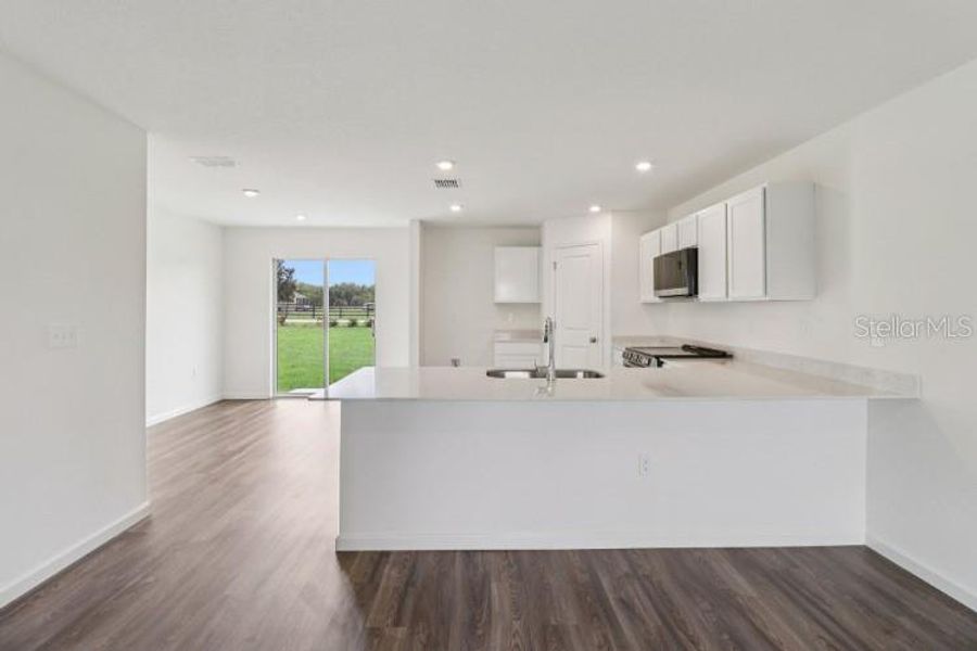Furnished interior view inside a new home in Palm Bay Classic, Palm Bay (Image 5).
