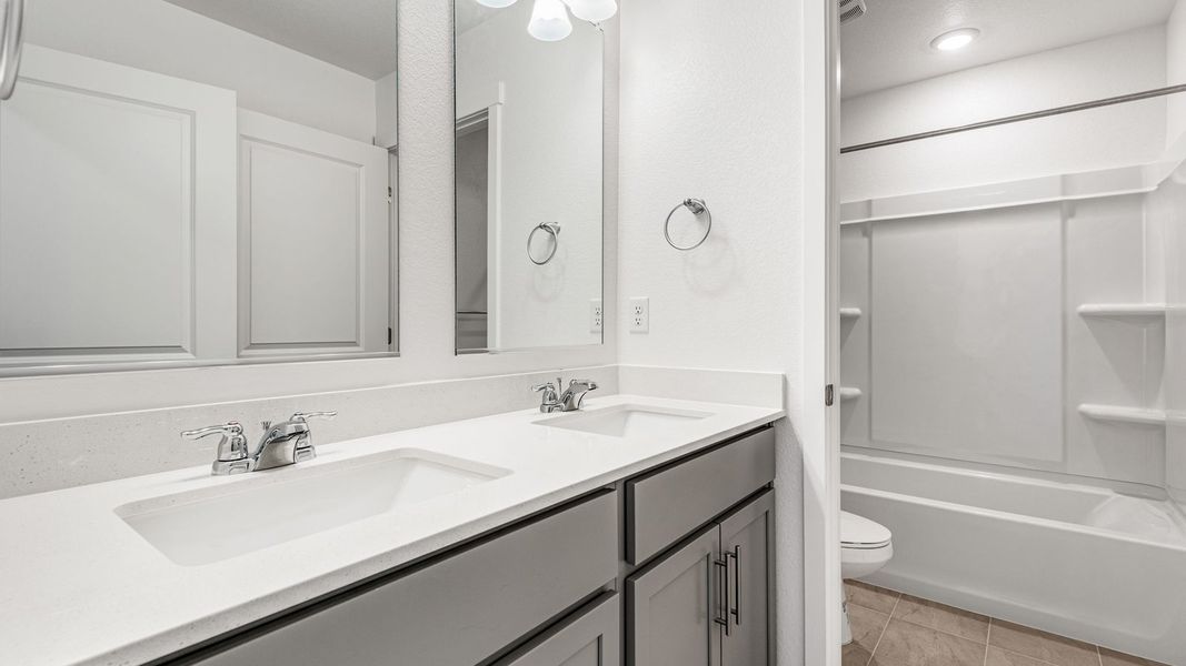 Furnished interior view inside a new home in Silver Peaks, Lochbuie (Image 9).