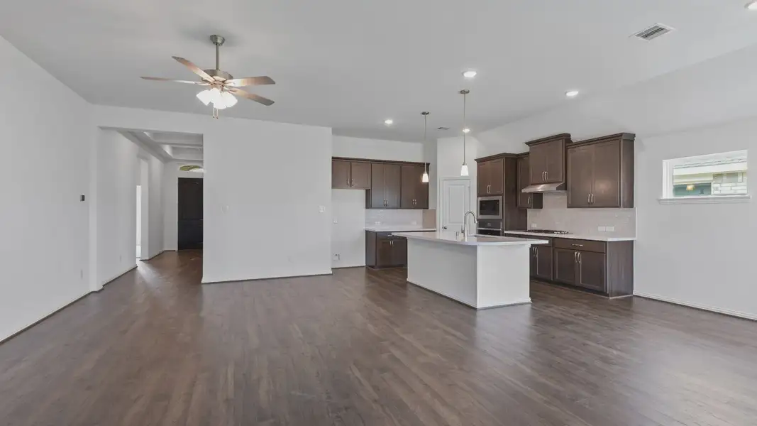 Furnished interior view inside a new home in Sunterra, Katy (Image 19).