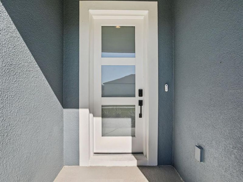 Exterior details and patio area of a home in Two Rivers - Signature Series, Zephyrhills (Image 4).