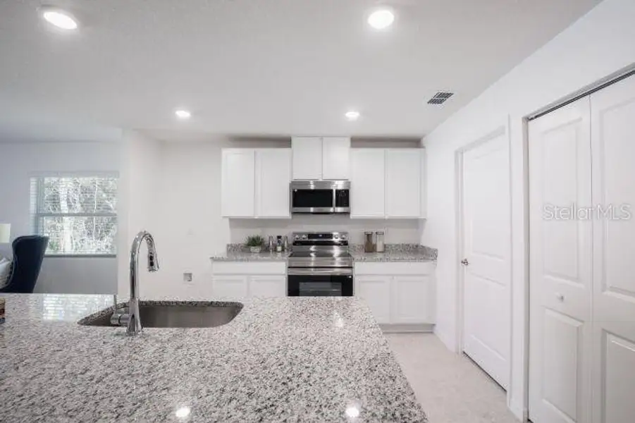 Furnished interior view inside a new home in Royal Highlands, Weeki Wachee (Image 4).