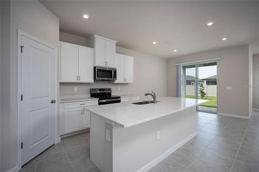 Furnished interior view inside a new home in , Port Charlotte (Image 7). Furnished interior view inside a new home in , Port Charlotte (Image 7).