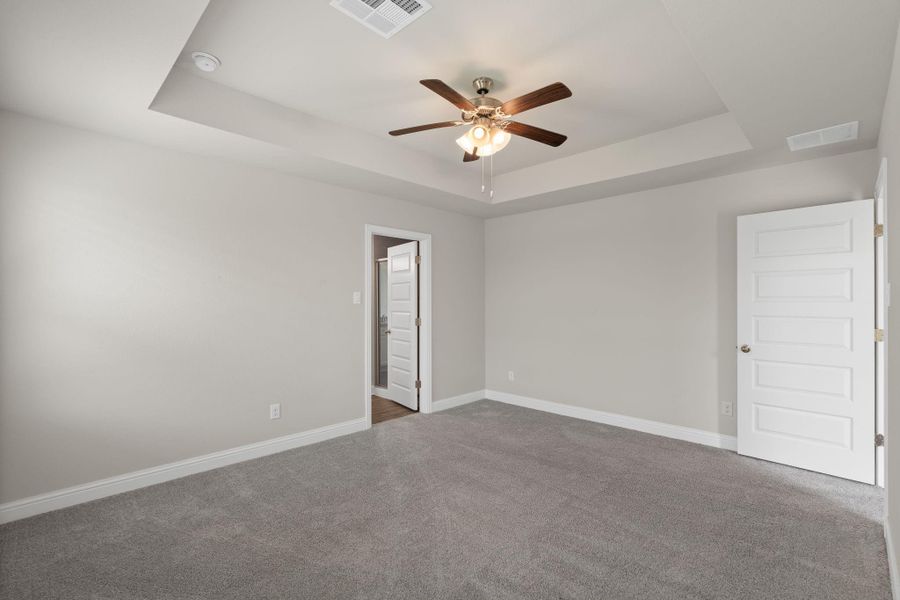 Spacious, unfurnished interior of a new home in Sunterra, Katy (Image 21).