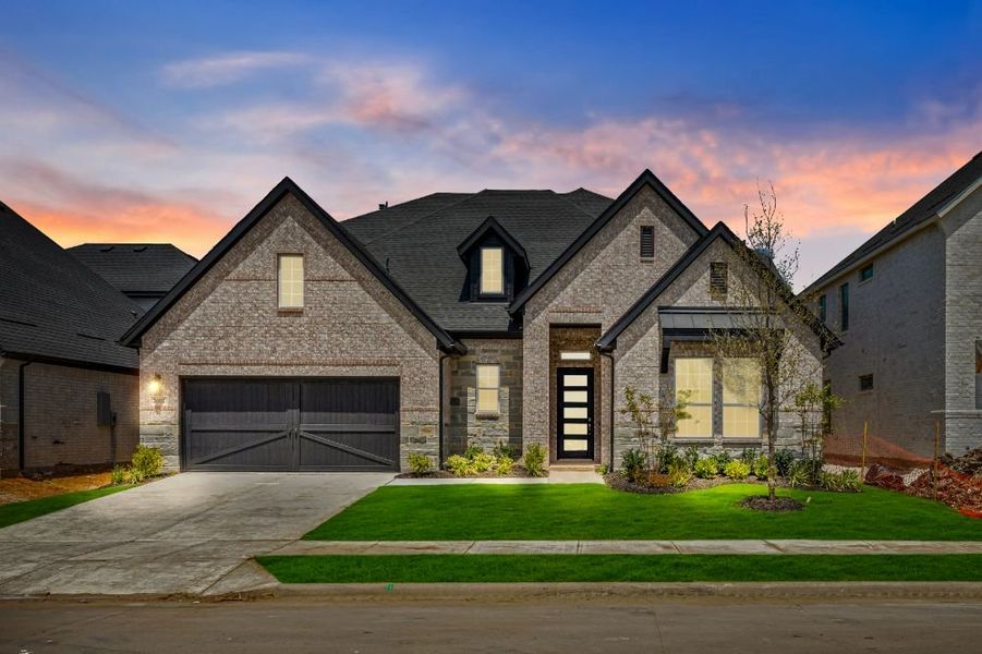 Representative exterior photo of a completed home built from the Grayson by UnionMain Homes in Cambridge Crossing, Celina, TX (Image 27).