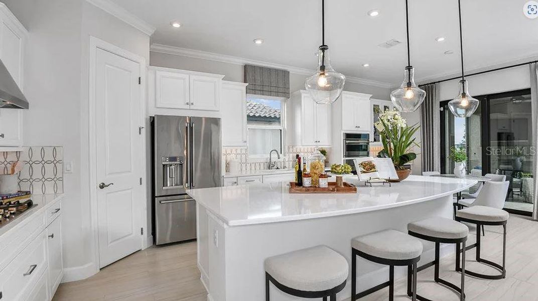 Furnished interior view inside a new home in Esplanade at Wiregrass Ranch, Wesley Chapel (Image 25).
