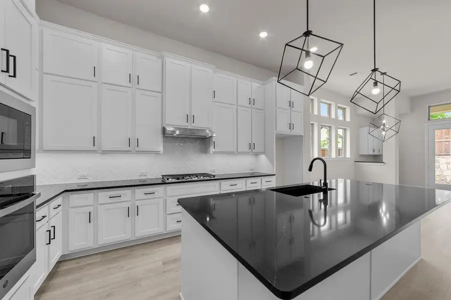 Furnished interior view inside a new home in South Pointe  Cottage Series, Mansfield (Image 9).