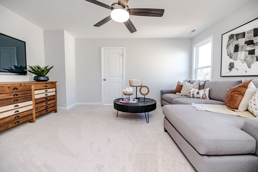 Representative furnished interior of a home built from the Winston by McKee Homes in Alder Creek, Benson (Image 9).