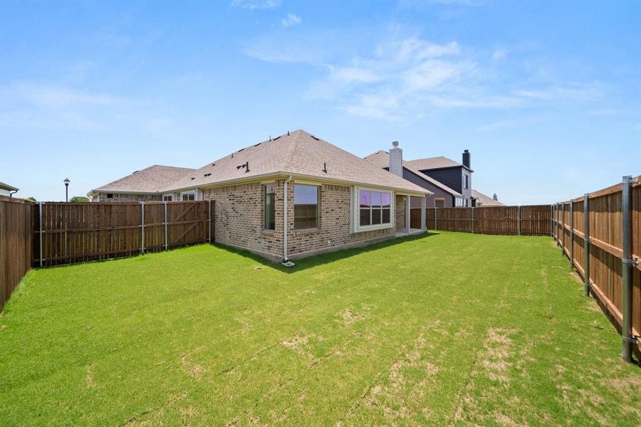 Front exterior of a new home in , Venus, TX, highlighting curb appeal (Image 23).