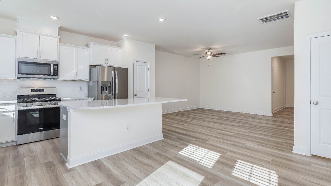 Furnished interior view inside a new home in Battle Bridge, Raleigh (Image 4).